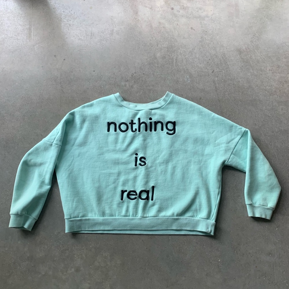 5PREVIEW boxy crop sweatshirt “nothing is real”